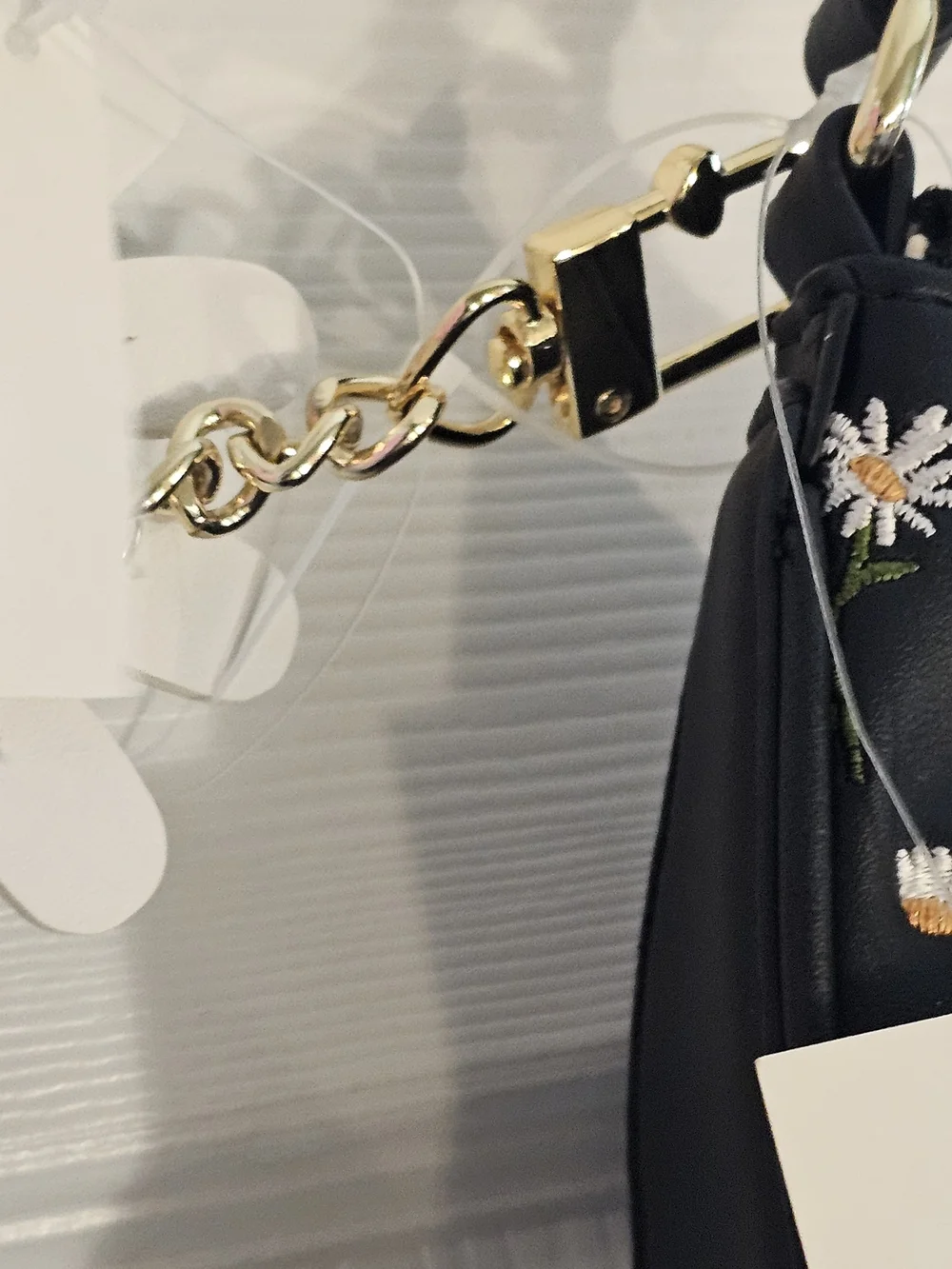 Betsey Johnson Black Daisy Crescent Shoulder Bag with Cream Charm
